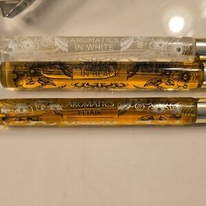 Clinique Elixir Perfume Set - White, Black, Gold